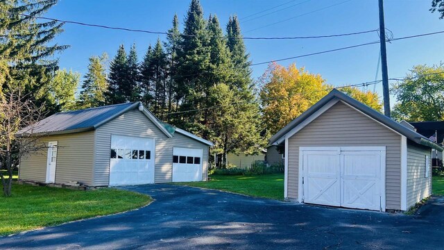 110 N Main St, Greenwood, WI 54437 - view of detached garage