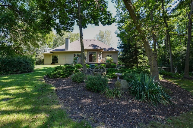 view of front of home with a front yard