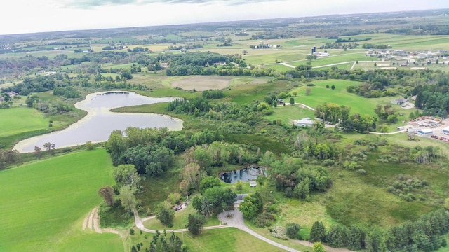 aerial view featuring a rural view and a water view