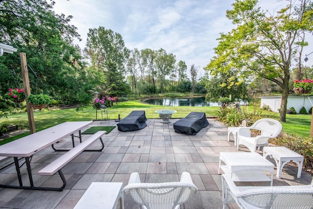 view of patio / terrace with a water view