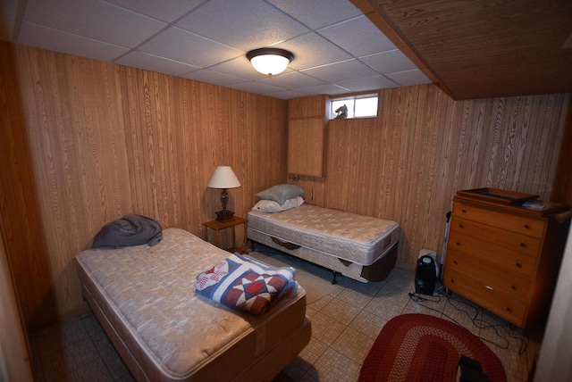 bedroom with a paneled ceiling