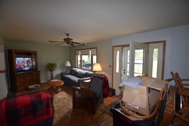 living room with carpet floors and ceiling fan