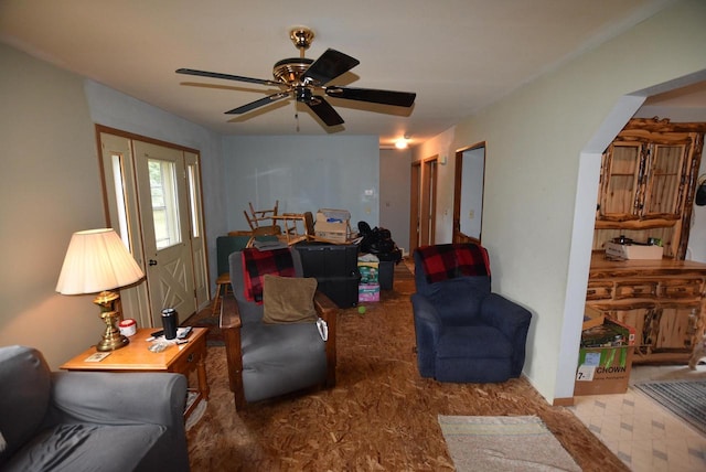 living room featuring ceiling fan