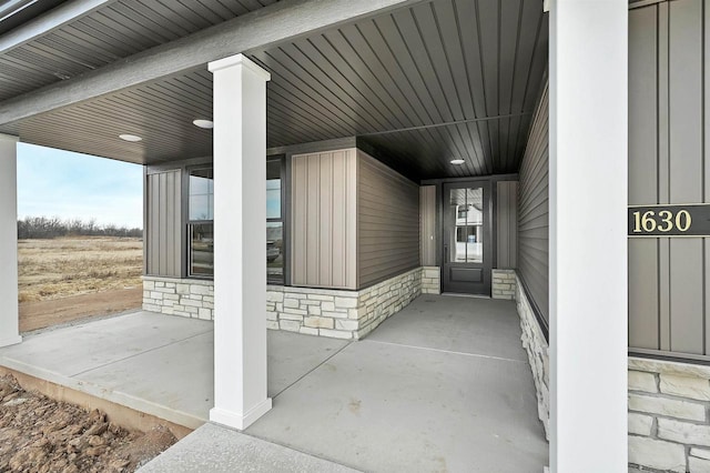 1630 N Honeysuckle Cir, De Pere, WI 54115 - entrance to property with stone siding and board and batten siding