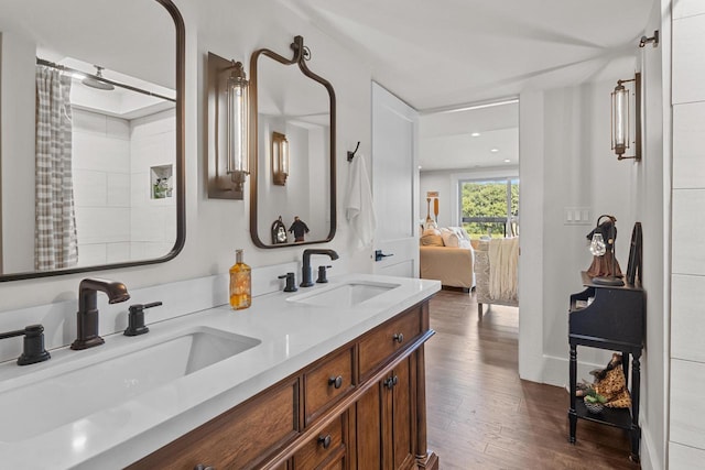 bathroom featuring vanity, a shower with curtain, and hardwood / wood-style floors