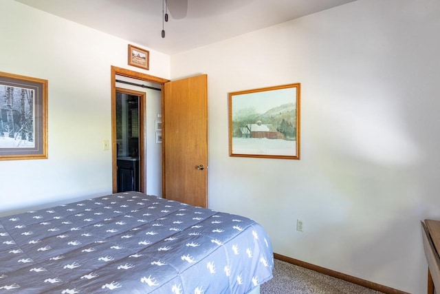 unfurnished bedroom with ceiling fan and carpet flooring