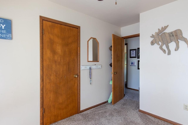 unfurnished bedroom with light colored carpet