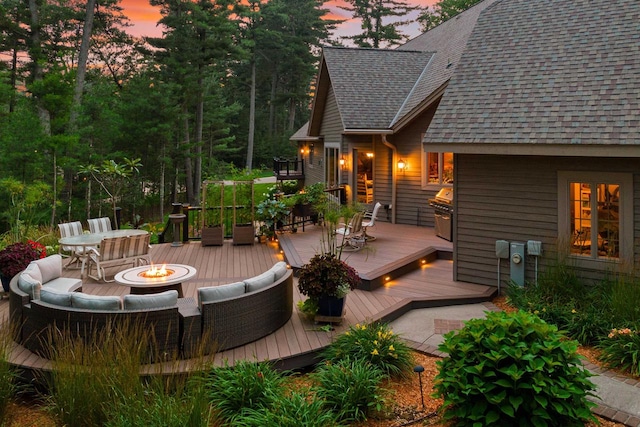 exterior space featuring an outdoor fire pit