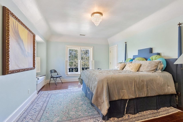 bedroom featuring wood-type flooring