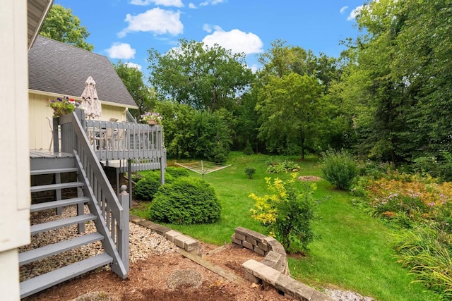 view of yard featuring a deck