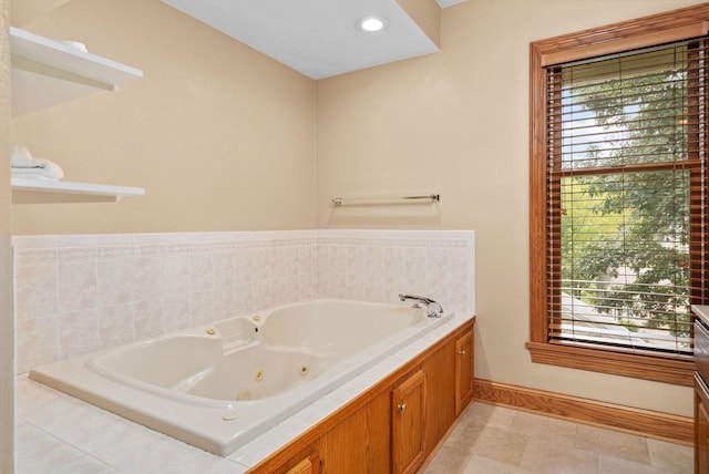 bathroom featuring tiled bath