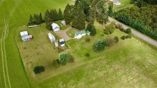 birds eye view of property featuring a rural view