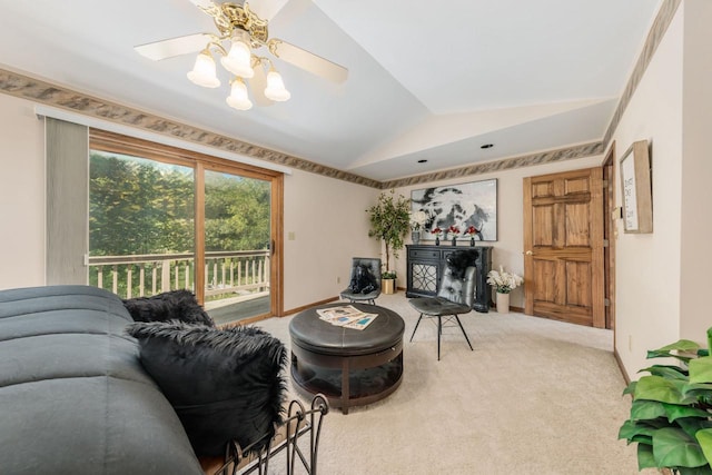 living area with lofted ceiling, a ceiling fan, baseboards, and carpet floors