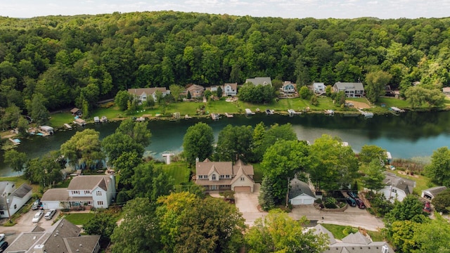 birds eye view of property featuring a residential view and a water view