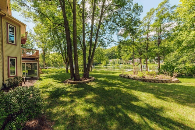 view of yard featuring a wooden deck