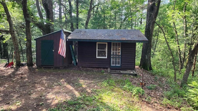 N697 County Rd N, Neshkoro, WI 54960 - view of shed featuring a forest view