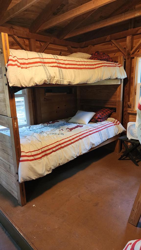 N697 County Rd N, Neshkoro, WI 54960 - bedroom with wooden walls