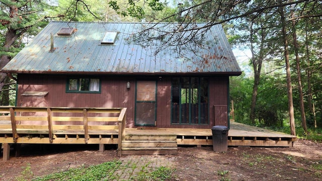 N697 County Rd N, Neshkoro, WI 54960 - back of property with metal roof and a deck