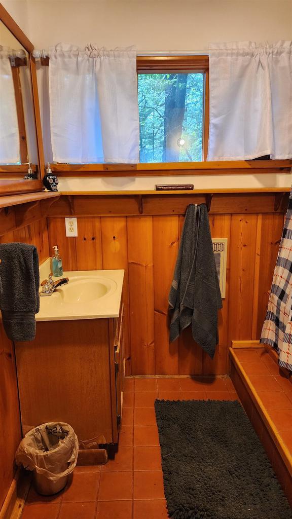 N697 County Rd N, Neshkoro, WI 54960 - bathroom with tile patterned flooring and vanity