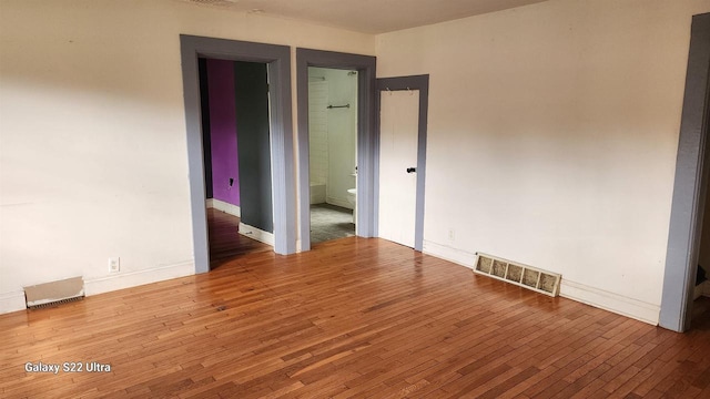 N697 County Rd N, Neshkoro, WI 54960 - unfurnished room with hardwood / wood-style floors and baseboards