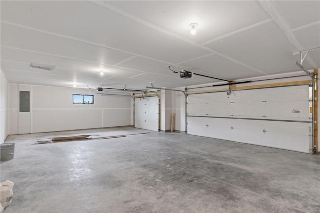 1915 Otter Way, New Richmond, WI 54017 - garage with a garage door opener and electric panel