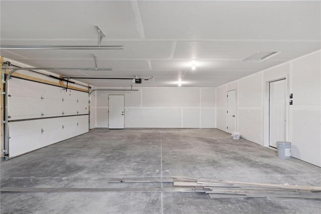 1915 Otter Way, New Richmond, WI 54017 - garage featuring a garage door opener