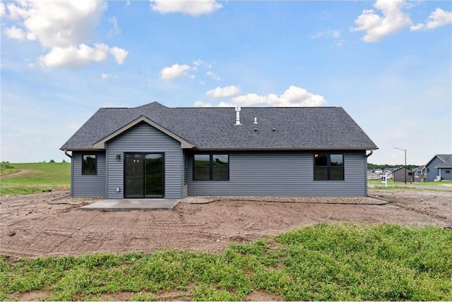 1915 Otter Way, New Richmond, WI 54017 - back of property featuring a patio area and roof with shingles