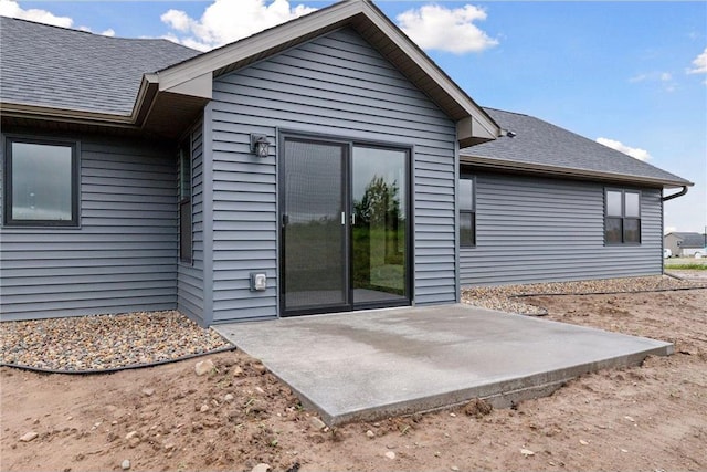 1915 Otter Way, New Richmond, WI 54017 - rear view of property featuring a patio area and a shingled roof