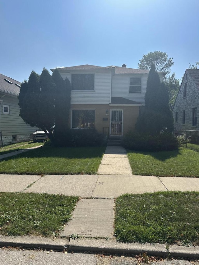 view of front property featuring a front yard