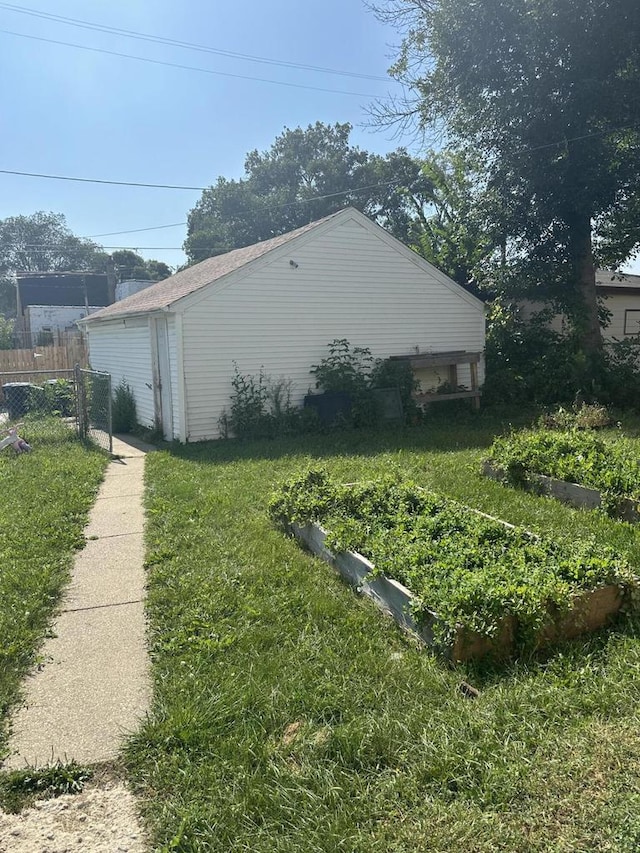 view of home's exterior with a yard