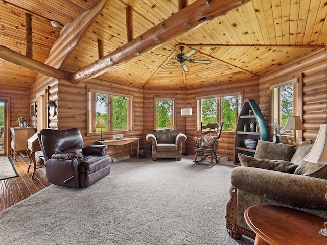 living room featuring wood ceiling, hardwood / wood-style floors, ceiling fan, and rustic walls