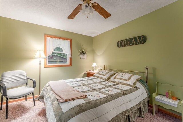 N1071 Ranch Rd, Holcombe, WI 54745 - bedroom featuring carpet flooring, ceiling fan, and a textured ceiling