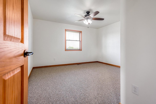 carpeted empty room with ceiling fan