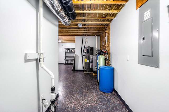 basement featuring electric panel and heat pump water heater