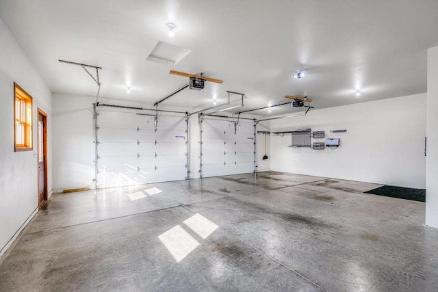 garage featuring a garage door opener