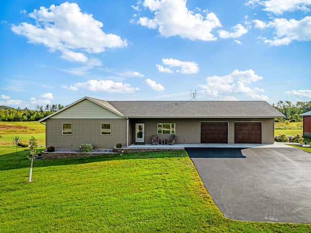 ranch-style house with a front lawn and a garage