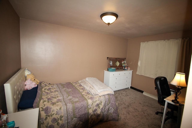 bedroom featuring carpet