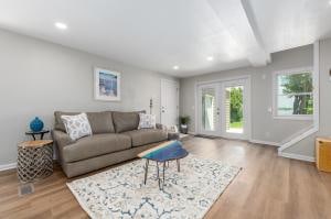 living room with hardwood / wood-style flooring and french doors