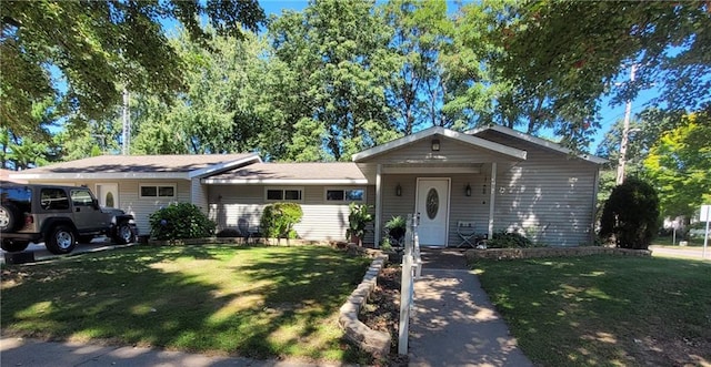 ranch-style home featuring a front yard