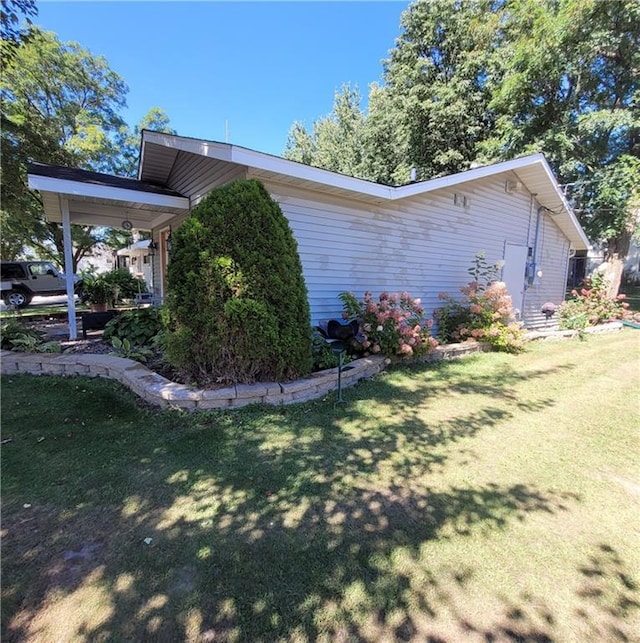 view of property exterior featuring a yard