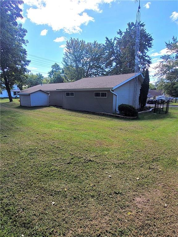 exterior space with a storage shed