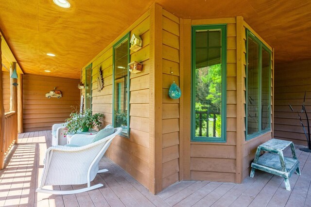 doorway to property featuring a porch