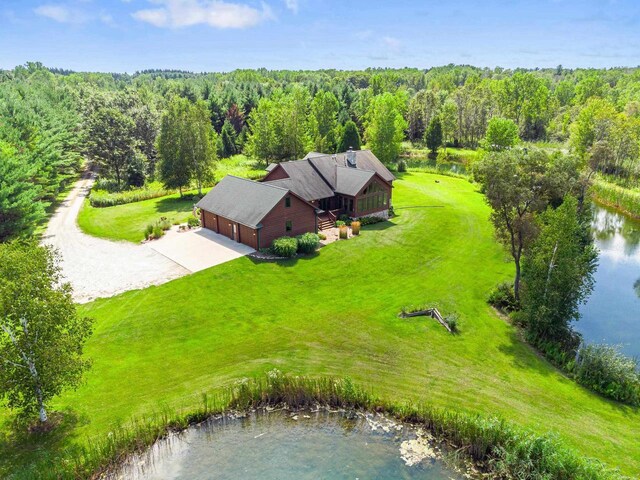 aerial view featuring a forest view