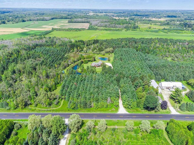 bird's eye view featuring a forest view