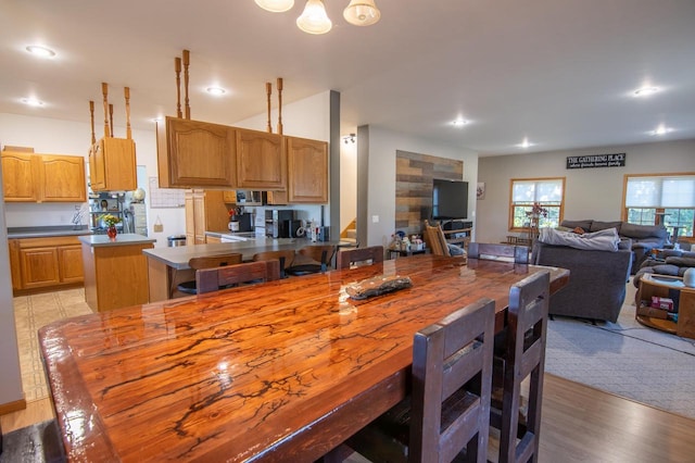 kitchen featuring light wood-type flooring and kitchen peninsula