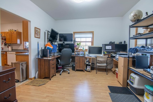 office area with light hardwood / wood-style flooring