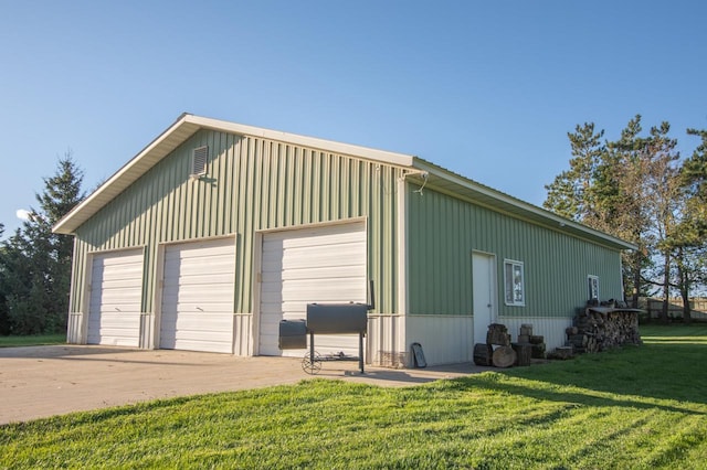 garage with a lawn