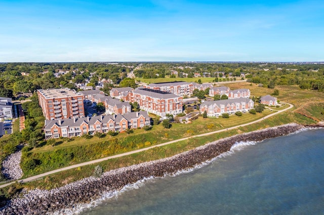 bird's eye view featuring a view of the beach and a water view