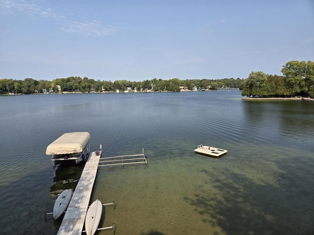 view of dock with a water view