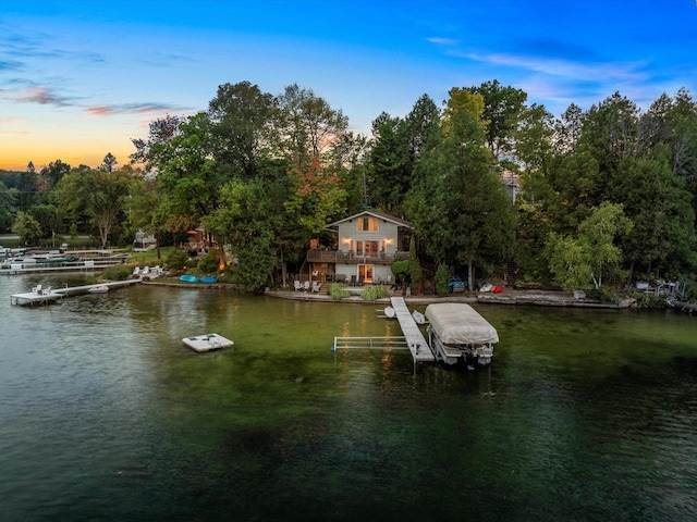 view of dock with a water view and boat lift